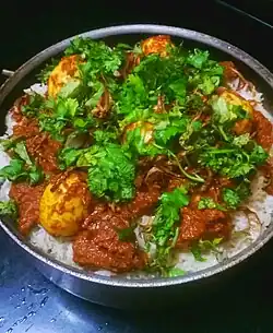 Egg Biryani garnished with cilantro