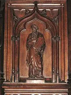 Carving if Moses on the pulpit