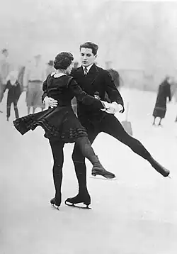 Emília Rotter and László Szollás figure skating on ice.