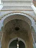 Zellij and muqarnas decoration at the entrance of the Sidi Bu Madyan Mosque in Tlemcen (14th century)