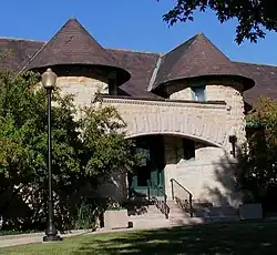 Entrance to the George C. Walker Library. The building and many of the books the library contained when it opened were a gift of George C. Walker, then president of the Blue Island Land and Building Company (his predecessor being F.H. Winston, a prominent Chicago attorney[1]). The original portion of the building was designed by Charles Sumner Frost and cost $12,000. It opened on April 22nd, 1890, was expanded by an addition that quadrupled its space in 1929,[2] and received a major renovation in 1995.