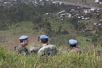 FC Gen. Santos Cruz, NKB commander, Brigadier General C B Ponnappa and FIB commander James Aloizi Mwakibolwa in the trenches of Munigi hill, 22 August 2013