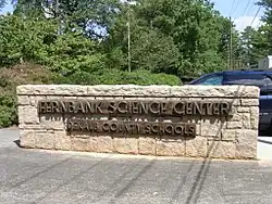 Main sign in front of science center.