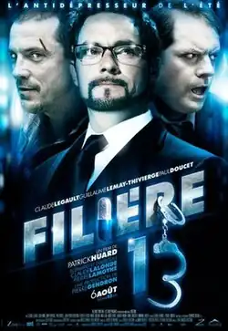 Poster for the film. The design features three serious-looking men—one with a cut on his face, one wearing glasses in the foreground, and another in a suit behind him. The title is prominently displayed in metallic block letters, with a capsule forming the letter "I" and a pair of handcuffs integrated into the number "3". Above, the tagline reads "L'antidépresseur de l'été" ("The antidepressant of the summer").