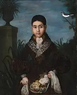 Filipina girl wearing 19th century dress, with shawl noticibly being a traditional Pañuelo.