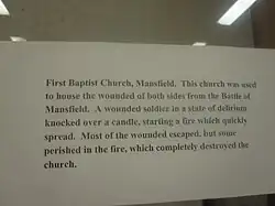 Historical marker at Mansfield State Historic Site referring to role of First Baptist Church during the battle of Mansfield