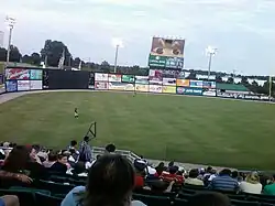 the outfield of Five County Stadium during a game