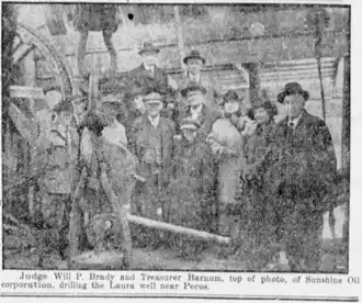 Black and white photograph of Brady and others