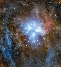 Wide-field, deep color image of the Pleiades and their surroundings. Processed by Adam Block (astrophotographer).