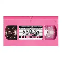 Cover art of Pink Tape, a pink cassette with the picture sleeve showing five members of the group f(x)