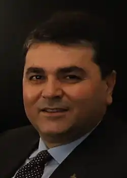 Chairperson of the Democrat Party Gültekin Uysal