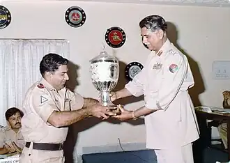 General Muhammad Iqbal Khan awarding a trophy to Lt. Col. Hamid Mahmood.jpg