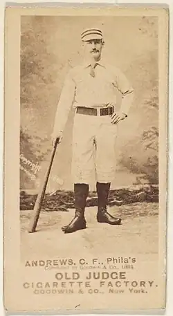 Man standing holding baseball bat