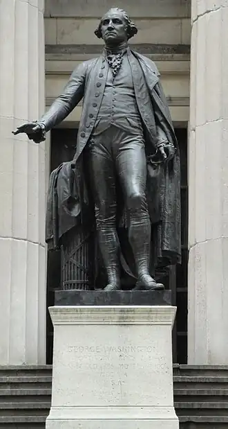 Statue of George Washington at the site of his inauguration as first president of the United States, now occupied by Federal Hall National Memorial, includes a fasces to the subject's rear right