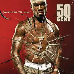 A shirtless 50 Cent wearing a cross necklace against a red background, when a broken glass effect radiating from the necklace. On the top left is the album name and the top right "50 CENT".