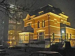 Office building illuminated by high-pressure sodium lamps