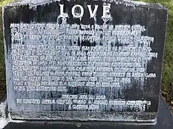 Discolored headstone of Harry Love (2019)
