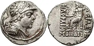 Tetradrachm of Heliocles I, showing the king helmetted and in uniform. Reverse shows seated Zeus and Greek legend: ΒΑΣΙΛΕΩΣ ΔΙΚΑΙΟΥ ΗΛΙΟΚΛΕΟΥΣ Basileōs Dikaiou Hēliokleous, "Of King Heliocles the Just".