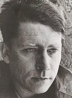 A young man's face looking off camera