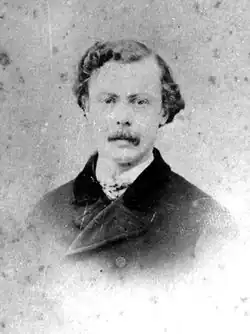 Photograph of Henry Hotzel looking at the casmera