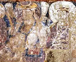 Probable Hephthalite royal couple in the murals of the Buddhas of Bamiyan circa 600 AD (the 38-meter Buddha they decorate is carbon dated to 544–595 AD).[111]