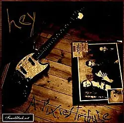 Minimalist album cover featuring the word "Hey" in block print