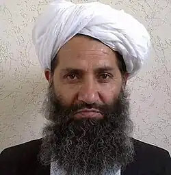Headshot of Hibatullah Akhundzada. He is a middle-aged man with a long beard, wearing a turban.
