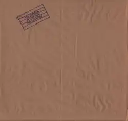 One of paper bag sleeve variants for original vinyl release. The stamped logo was used on the front cover for original tape releases and 2015 reissue.
