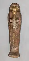 Lid of gilded coffin shaped like a mummy