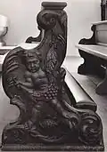 Carved side of church bench