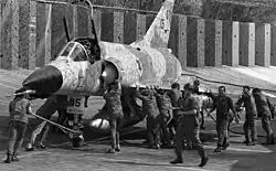 An IAI Nesher of the 113 Squadron "Hornet" is made ready for takeoff at Hatzor Airbase in October 1973