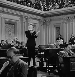 Smith pursues his filibuster in the Senate chamber before senators deliberately ignoring him.