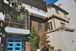 School entrance with sky blue double doors