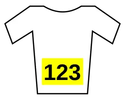 A white jersey with a yellow number bib.