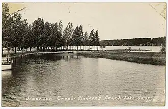 old photo of creek between lakes