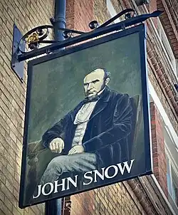 Sign outside on Broadwick Street wall