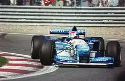 Johnny Herbert racing for Benetton (non-tobacco livery) at Montreal in 1995