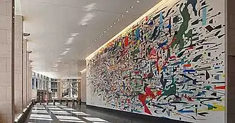 Photo of Mural on the right wall of a hallway