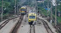 KTM Class 81 EMU14 & Class 82 EMU42, both at Sungai Buloh station.