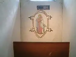Mural of a Madonna painted by Grace Gifford Plunkett while she was held during the Civil War.