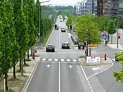 South-facing view from the (since demolished) footbridge over Avenue John F. Kennedy circa 2015