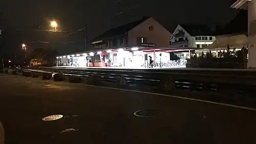 Two-story building with gabled roof