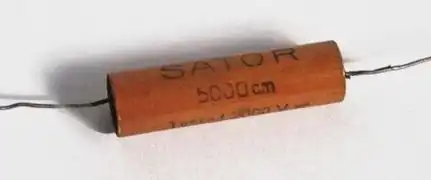 Wound metallized paper capacitor from the early 1930s in hardpaper case, capacitance value specified in "cm" in the cgs system; 5,000&nbsp;cm corresponds to 0.0056&nbsp;μF.