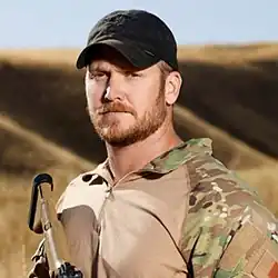 Chris Kyle against a desert background