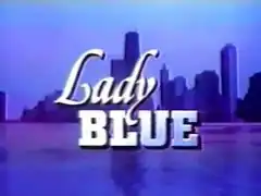 A cityscape, with the title "Lady Blue" superimposed on it