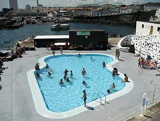 Municipal swimming pools, showing the Porto dos Carneiros and urbanized core of the civil parish of Nossa Senhora dos Rosário