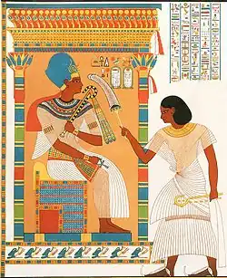 Amenhotep (Hawi) in front of Tutankhamun