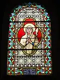 Stained glass window of Saint Genevieve