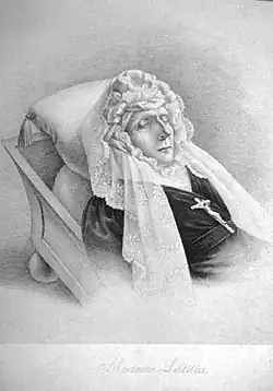 Letizia Bonaparte lying in bed with eyes closed and veil over her head