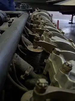 Detail closeup of a Liberty L-12's upper valvetrain, showing the similarity to the later-production Mercedes design